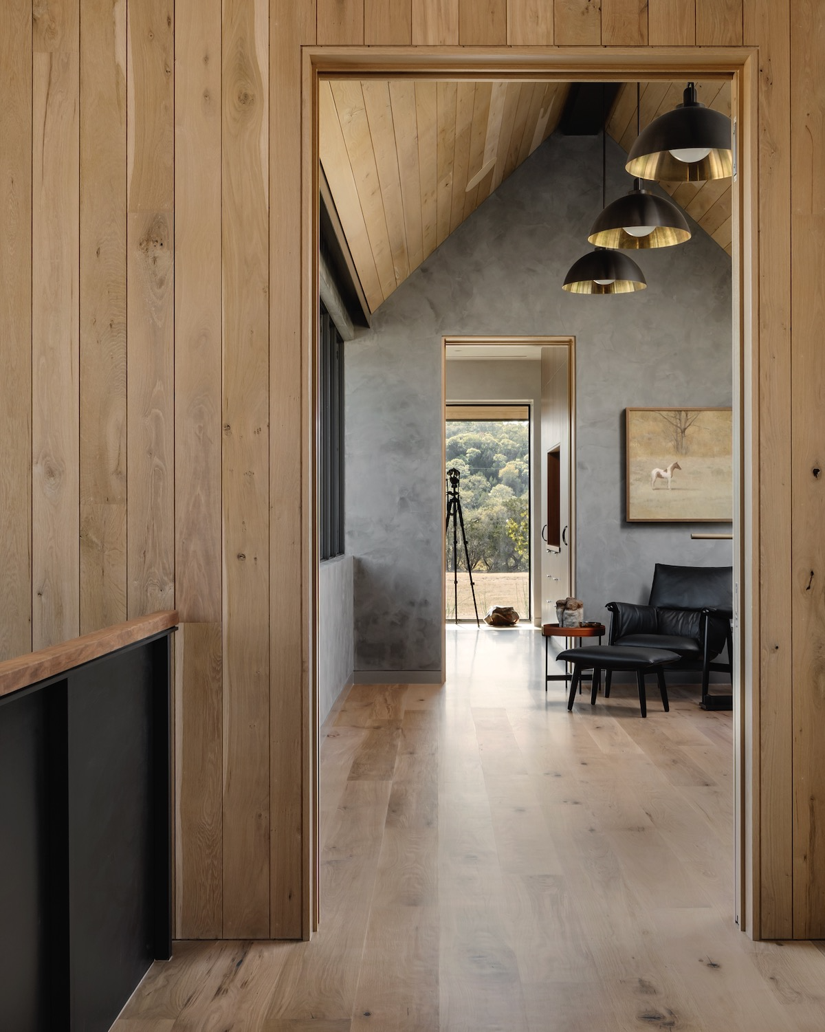 Plaster feature wall in a modern ranch home in Blanco, Texas designed by Jobe Corral Architects.